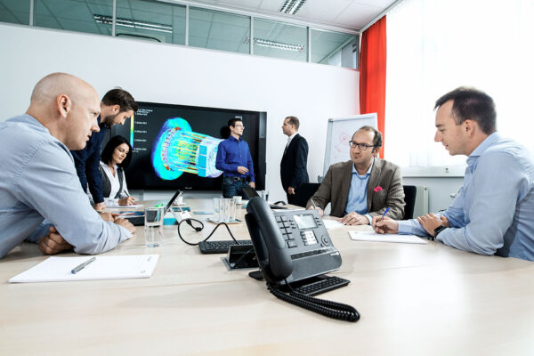 TSA Meeting scene - employees together with customers in consultation meetings